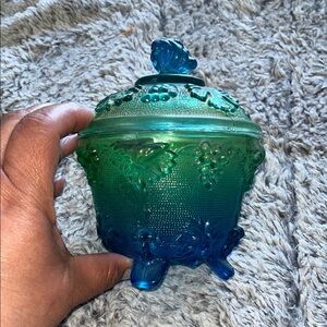 Vintage Jeanette Glass candy dish with a lid.